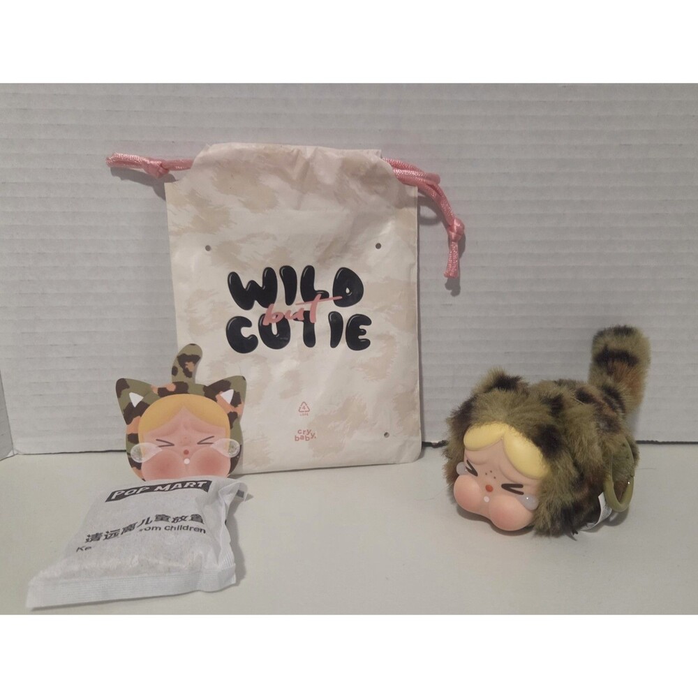 Used for display. No Box Authentic Popmart Wild But Cutie Camo Cutie Keychain